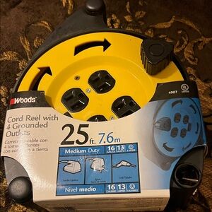 Coleman Yellow and Black Cord Reel with 4 Grounded Outlets